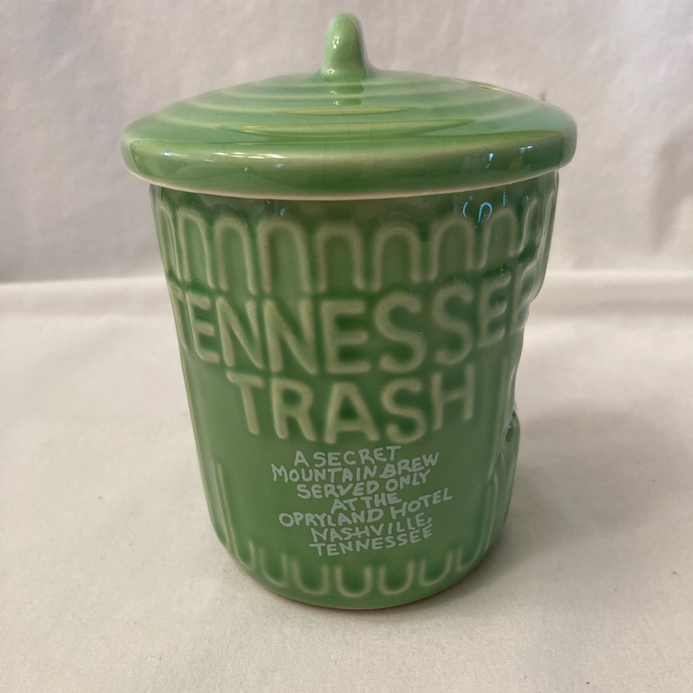 Tennessee Trash Green Ceramic Coffee with Lid. Souvenir from Opryland Hotel